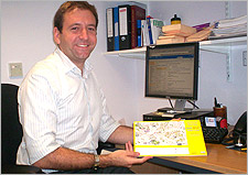 Dr holding Walk England produced map